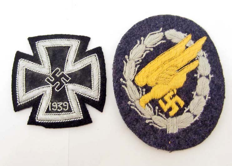 GERMAN NAZI LUFTWAFFE PARATROOPER FALLSCHIRMJAGER JUMP: Machine embroidered cotton construction on grey wool backing. Also included is a 1st class iron cross. Silver bullion wire construction embroidered on a black wool backing.