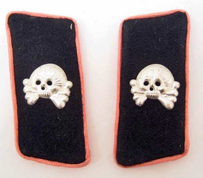 PAIR OF GERMAN NAZI ARMY PANZER WRAPPER EM COLLAR TABS: Approx. 1 3/8" by 3". Both have an aluminum skull mounted in the center of the black wool tab. Pink piping signifies armored corps. for an enlisted man.