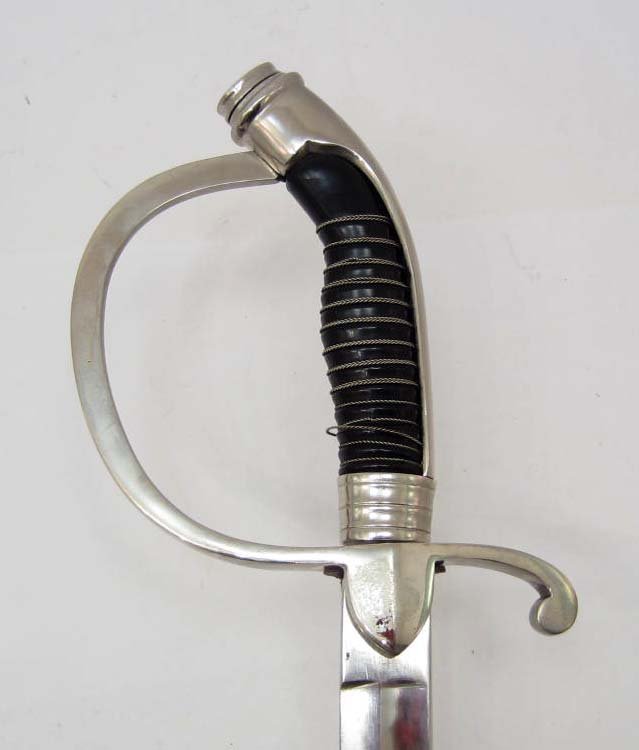 GERMAN NAZI BAVARIAN ARMY OFFICERS SWORD W/ SCABBARD: Approx. 38 3/4" long overall. Steel blade is approx. 13/16" wide by 31 1/2" long. It is double engraved and reads in Treue fest. Has a very fine curve to the blade. Includes the black painted steel sc