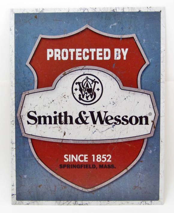 7726 - PROTECTED BY SMITH & WESSON METAL SIGN: approx : 16 x 12 inches