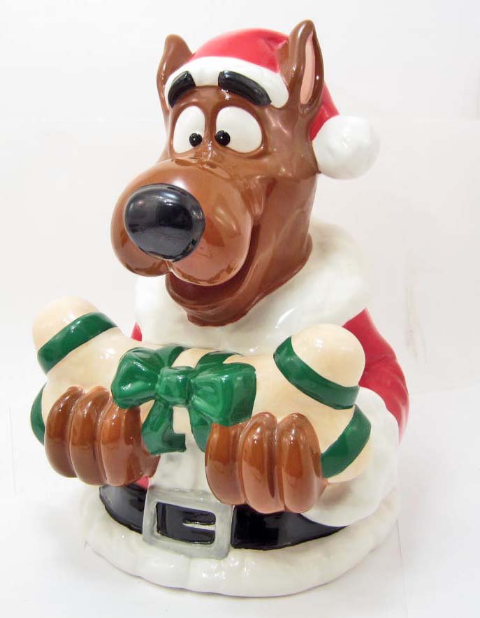 COOKIE JAR - SCOOBY DOO CHRISTMAS - WARNER BROS STUDIO: In the original box, a Scooby Doo Christmas Santa cookie jar. Measures approximately 12" tall.