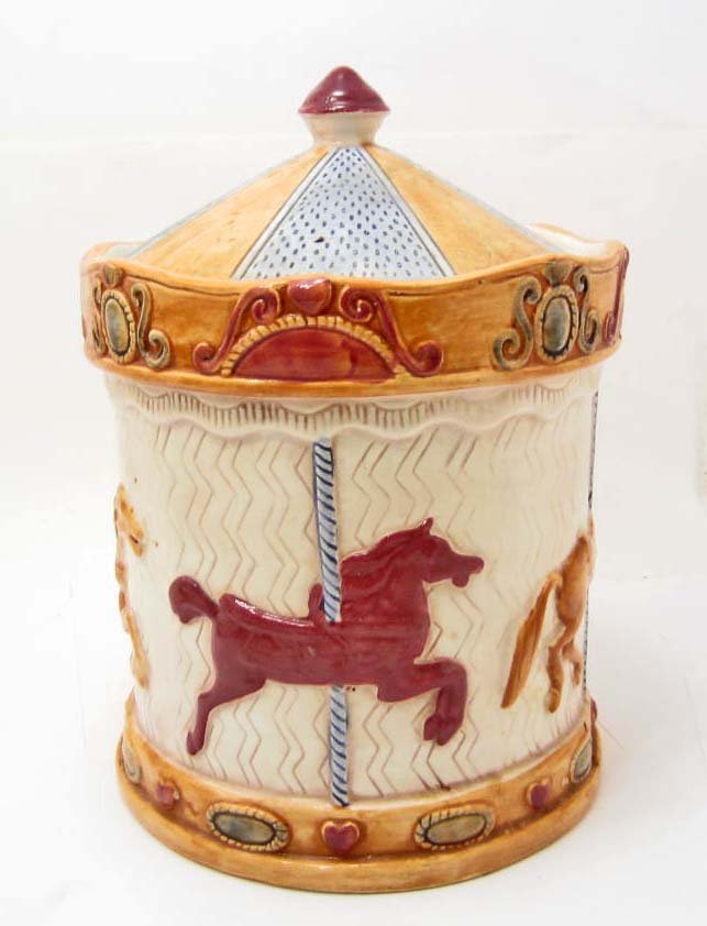COOKIE JAR - CAROUSEL - TREASURE CRAFT: Approx. 12" tall. Repaired lid