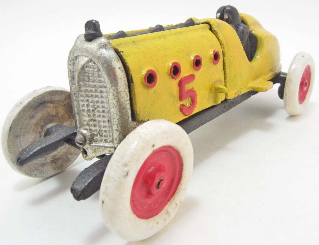 CAST IRON RACE CAR W/ DRIVER: Approx. 9" long