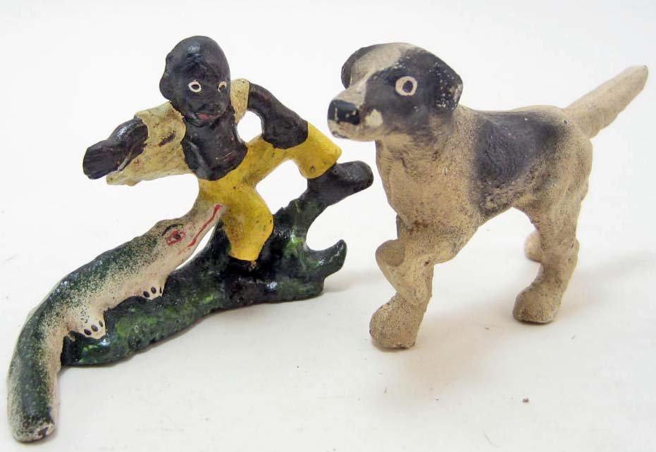LOT OF 2 CAST IRON BOTTLE OPENERS: Irish Setter Dog and Black Americana Boy w/ Alligator. Both Approx. 4" each.