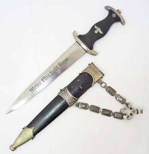 RARE GERMAN NAZI WAFFEN SS DAGGER W/ SCABBARD: Chained Officers Himmler Presentation Dagger w/ scabbard. Approx. 14 11/16" long overall. The front of the steel blade engraving reads Meine Ehre heisst Treue (My Honor is Loyalty) The reverse side en