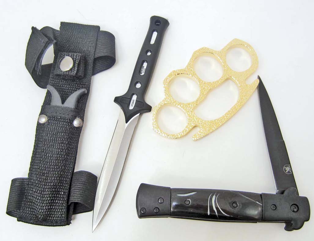 LOT OF MISC. KNIVES AND BRASS KNUCKLES PAPERWEIGHT: Solid brass knuckles paperweight (Cannot ship to MA, CA, NY, NJ, or PA) United Cutlery special agent stinger knife w/ sheath, Gangster style stiletto knife with black pearl handle. (Cannot ship to NY)