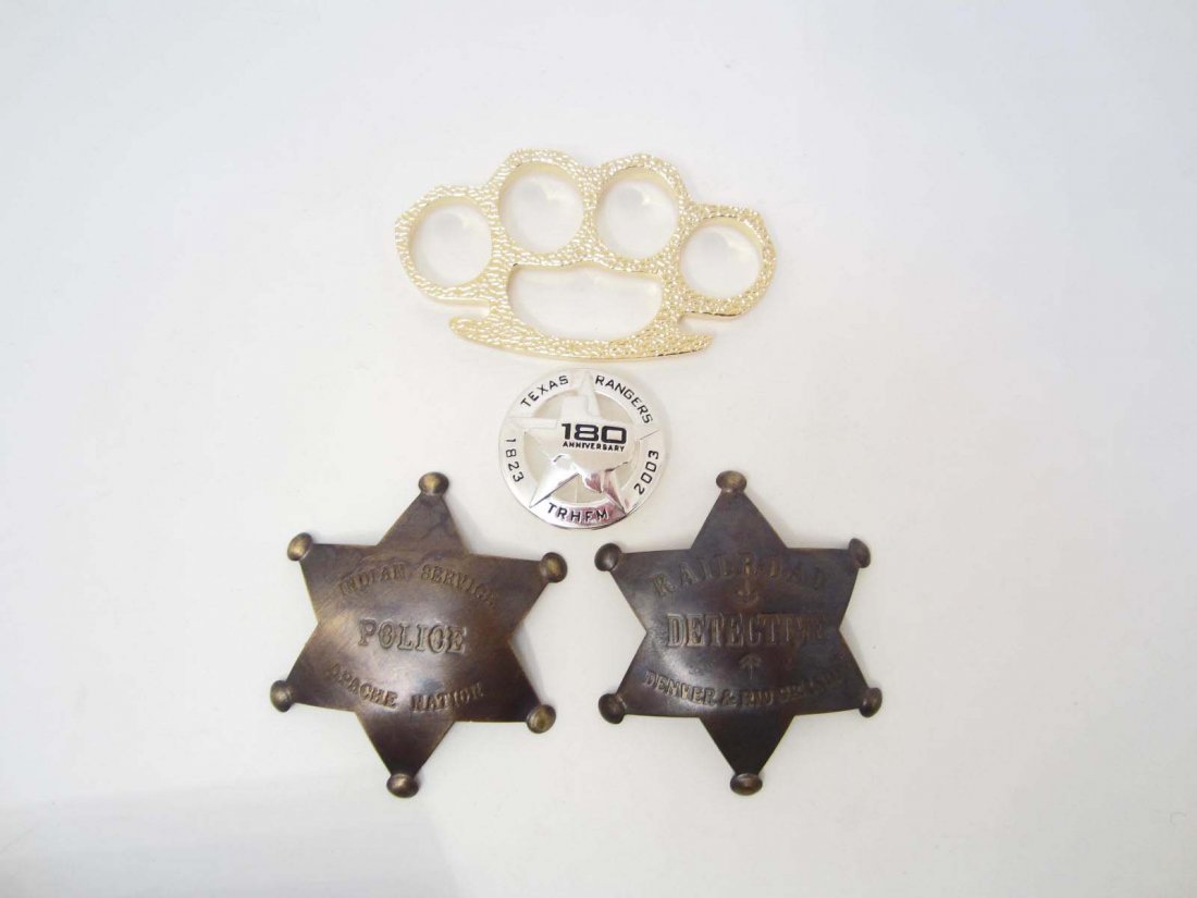 LOT OF MISC. WESTERN BADGES & BRASS KNUCKLE PAPERWEIGHT: Solid brass knuckles paperweight (Cannot be shipped to MA, CA, NY, NJ, or PA) Railroad Detective Denver & Rio Grande badge, Indian Service Police Apache Nation badge, Texas Rangers 180th Anniversary l
