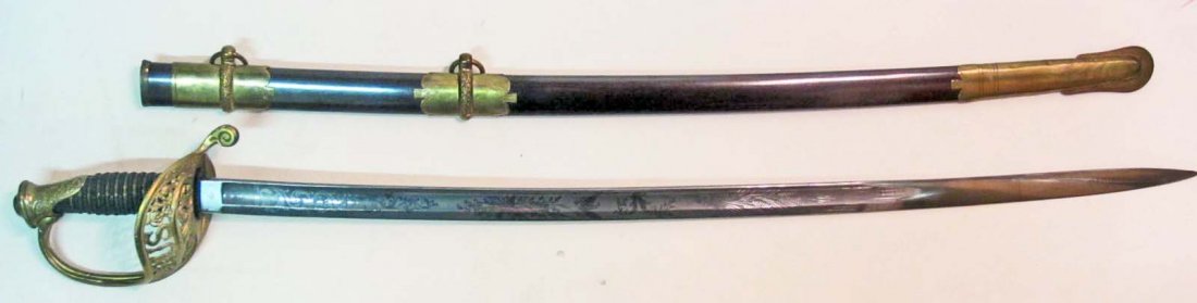 US CIVIL WAR UNION ARMY 1850 STAFF & FIELD OFFICERS: With Scabbard. Approx. 37" long overall. Steel blade is maker marked Ames Mfg Co Chicopee Mass. Blade is approx.1 1/8" wide by 30 1/2" long. It is double engraved w/ a military motif. it includes a fl