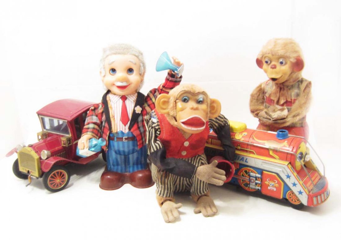 LOT OF 5 VINTAGE C. 1950'S TIN LITHO BATTERY OP. TOYS: Train Engine, Old Time Car, Bartender, Monkey w/ a Dice Cup & a Monkey that Blows Bubbles. None have been tested.