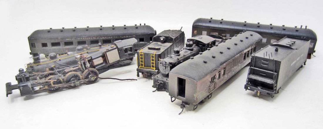 LOT OF 8 VINTAGE TRAIN CARS & ENGINES: Lot is made up of Wood, Plastic & Metal Train Cars, Engines & Parts. One train car is marked VARNEY on the bottom.