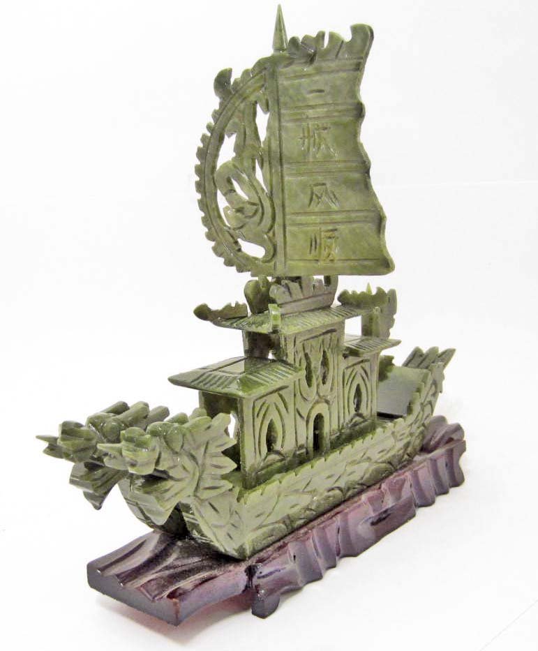 HAND CARVED NATURAL CHINESE JADE SHIP W/ WOOD STAND: Approx. 10" long by 9.5" tall. Three pieces, bottom wood stand, dragon ship and top sail. AMAZING hand carved Dragons.