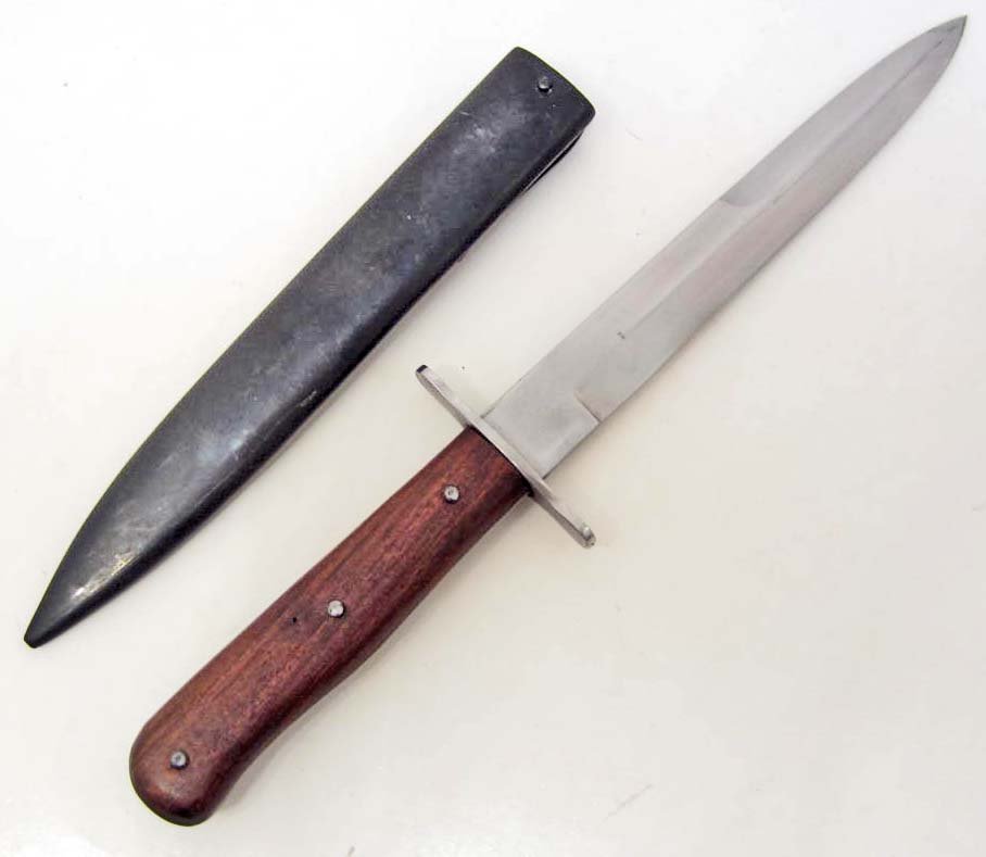 GERMAN NAZI ARMY COMBAT BOOT KNIFE W/ SCABBARD: Approx. 11 7/8" long overall. has a pair of oak wood grips that are riveted on with three rivets. The steel blade is approx. 7/8" wide by 6 13/16" long. The black painted steel scabbard is approx. 1 3