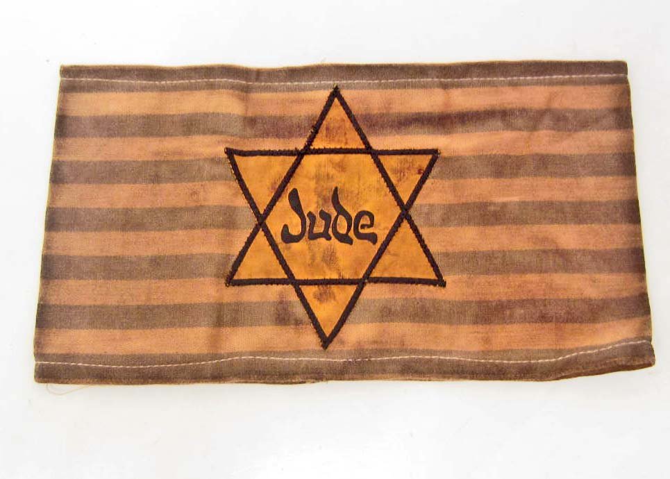 GERMAN NAZI JUDEN JEWISH CONCENTRATION CAMP ARM BAND: Approx. 4 3/4" by 8 3/4". Two piece machine sewn cotton construction.