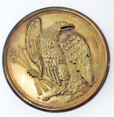 US CIVIL WAR UNION ARMY CARTRIDGE BELT PLATE: Measures 2 ½" in diameter. Shows a patriotic Eagle on the front holding arrows and the tree branch. Has three prongs on the reverse side for securing to the leather belt. Stamped brass construction w