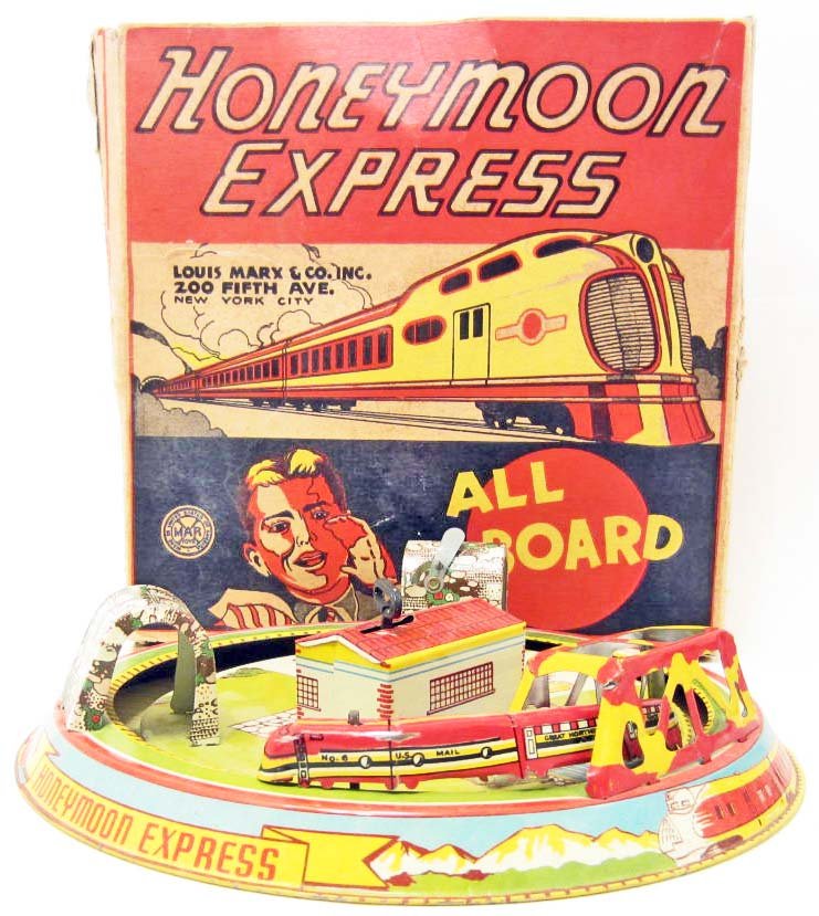 VINTAGE C. 1940'S MARX TIN LITHO WIND UP TRAIN IN ORIG: Honeymoon Express Wind up train. Working condition.