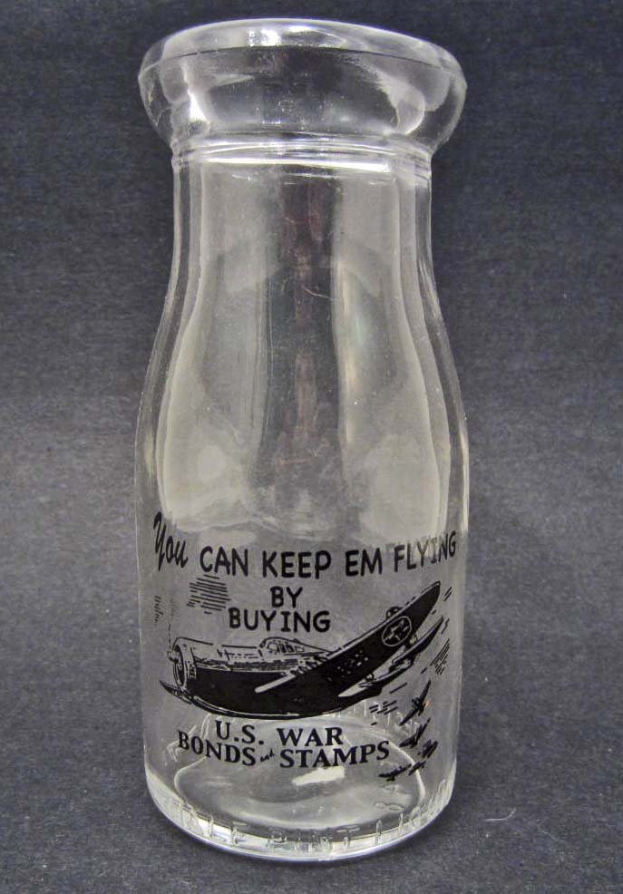 U.S WAR BONDS AND STAMPS ADVERTISING MILK BOTTLE: approx : 5.5 inches