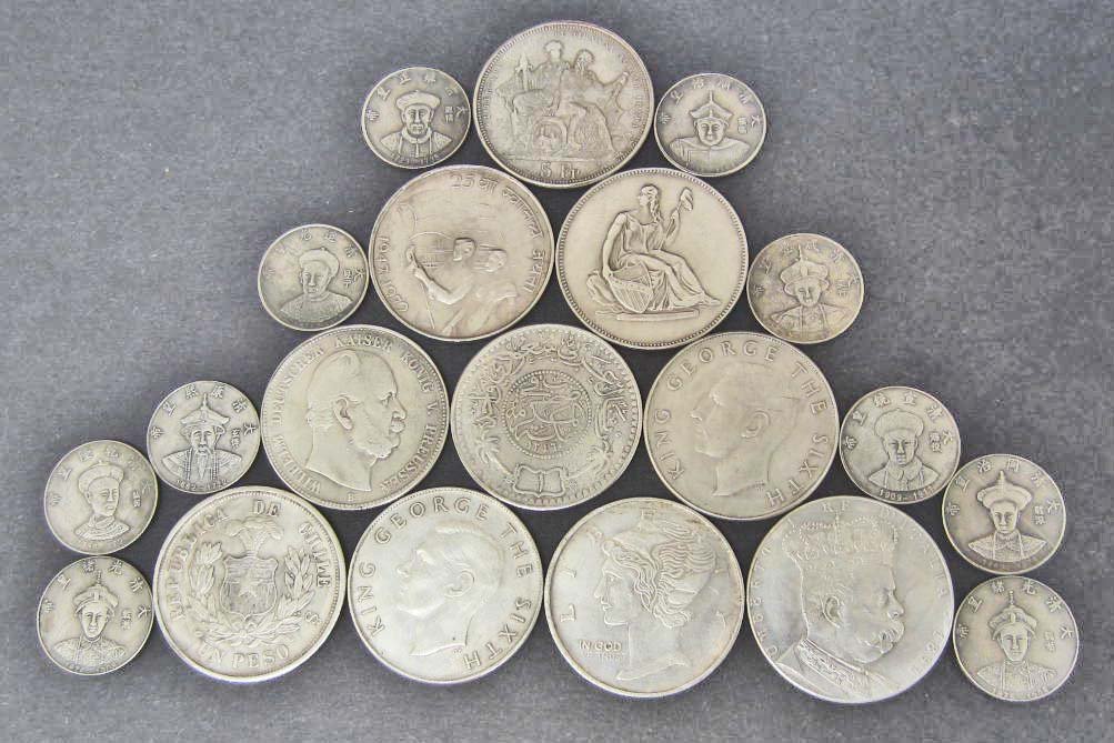 LOT OF 20 ASSORTED FOREIGN COINS: George the 6th South Africa Coin, Deutsches Reich Funf Mark Coin, Republica De Chile, More. A couple are marked one troy ounce but they are not.