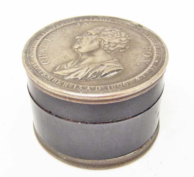ENGLISH SNUFF BOX W/ METAL EMBOSSED LID W/ ENGLISH: The lid shows English Politician charles James Fox and states This illustrious Patriot departed this Life September 13 AD 1806. The bottom of the box reads Intrepid champion of Freedom, Enlightened Ad