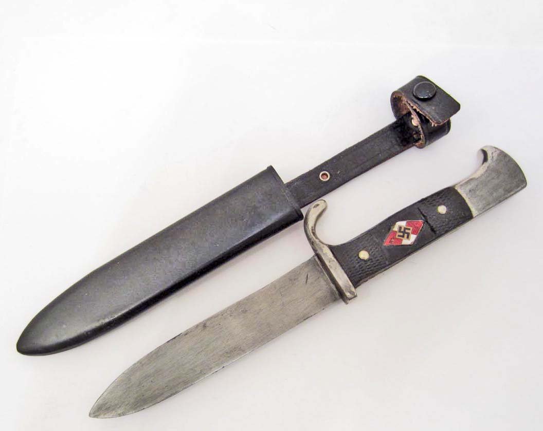 GERMAN NAZI HITLER YOUTH HJ COMBAT KNIFE W/ SCABBARD: Measures 10" long overall. The steel blade is maker marked Puma Solingen Ges Geschutz. The puma head logo is above. The black painted metal scabbard measures 1 ¼" wide by 6" long. There is a black le