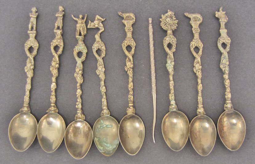 LOT OF 8 VINTAGE ORNATE SOUVENIR SPOONS: Tops of each spoon are figural and incl., Soldiers, Clown, Wolf, more.