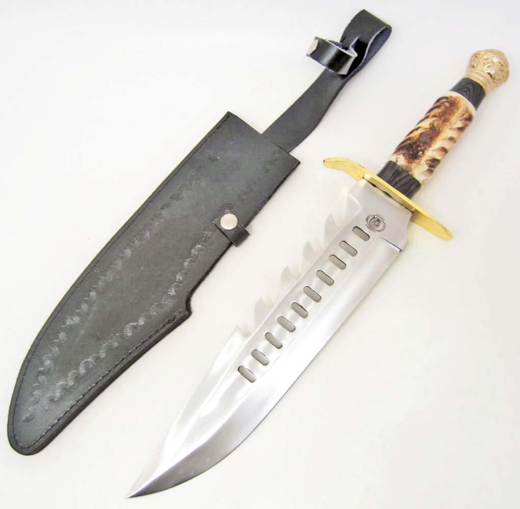 CHIPAWAY RETURN OF THE UNDERTAKER KNIFE: Approx. 16 5/8" overall. 10 1/2" stainless bowie blade w/ sawback & cutout design. Burnt sawcut bone handles with brass guard &pommel. Black leather belt sheath.