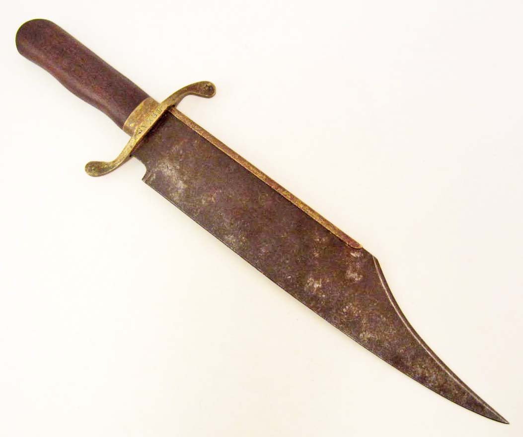 CONFEDERATE STATES CIVIL WAR TEXAS COMBAT BOWIE KNIFE: Measures 18 3/8" long overall. The steel blade with a brass spine measures 2 3/8" wide by 12 3/4" long. The brass cross guard is marked Texas with stars stamped in each corner. Has a solid oak wood ha