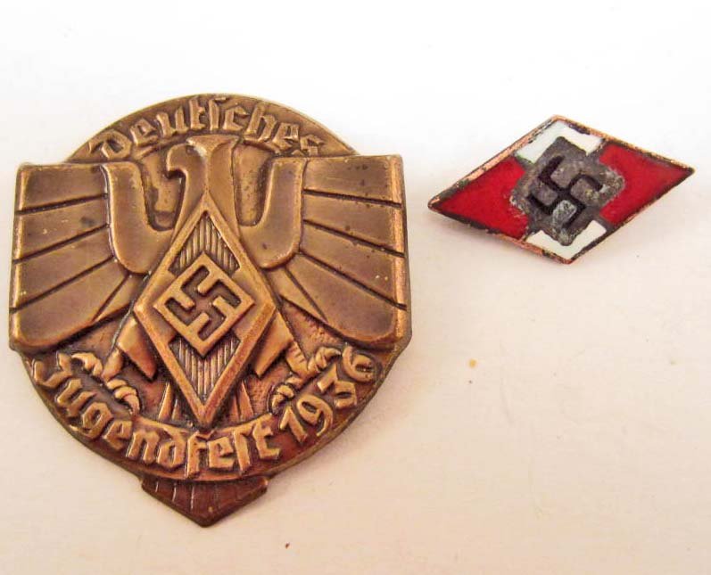 GERMAN NAZI HITLER YOUTH HJ TINNIE BADGE: Pin back. Stamped brass construction. Also included is a Hitler Youth Enameled Diamond. Pin back. Maker marked Otto Hoffmann ges gesch