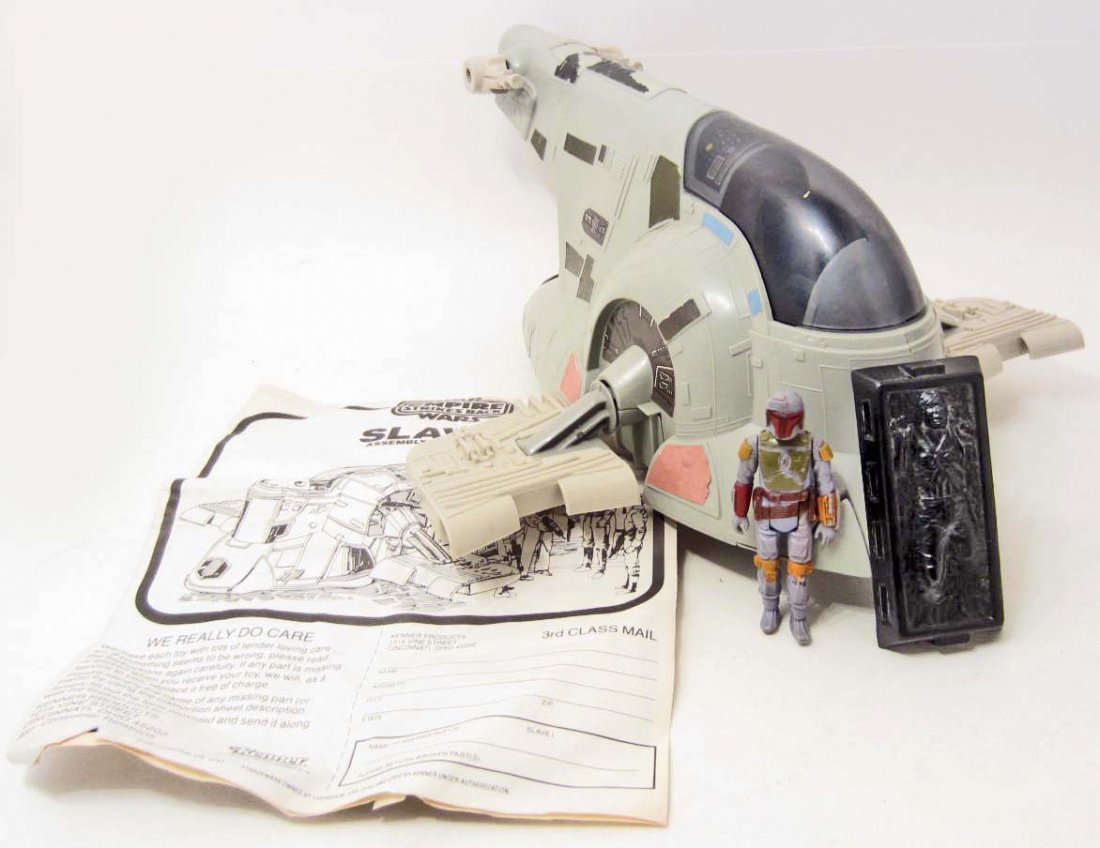 VINTAGE 1981 STAR WARS EMPIRE STRIKES BACK SLAVE I: Includes Boba Fett, Carbonite Han Solo and original instructions. Still works, looks complete, good played with condition.