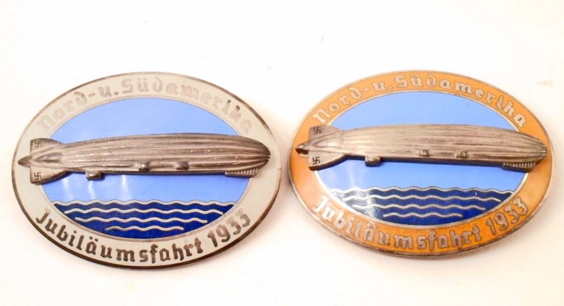 LOT OF 2 GERMAN NAZI GRAF ZEPPELIN AIR SHIP BADGES: They measure 2" wide by 1 1/2" tall. Both are maker marked 'Kerbach Dresden'. They heave a thin horizontal pin back. Two piece nickel construction with enamel