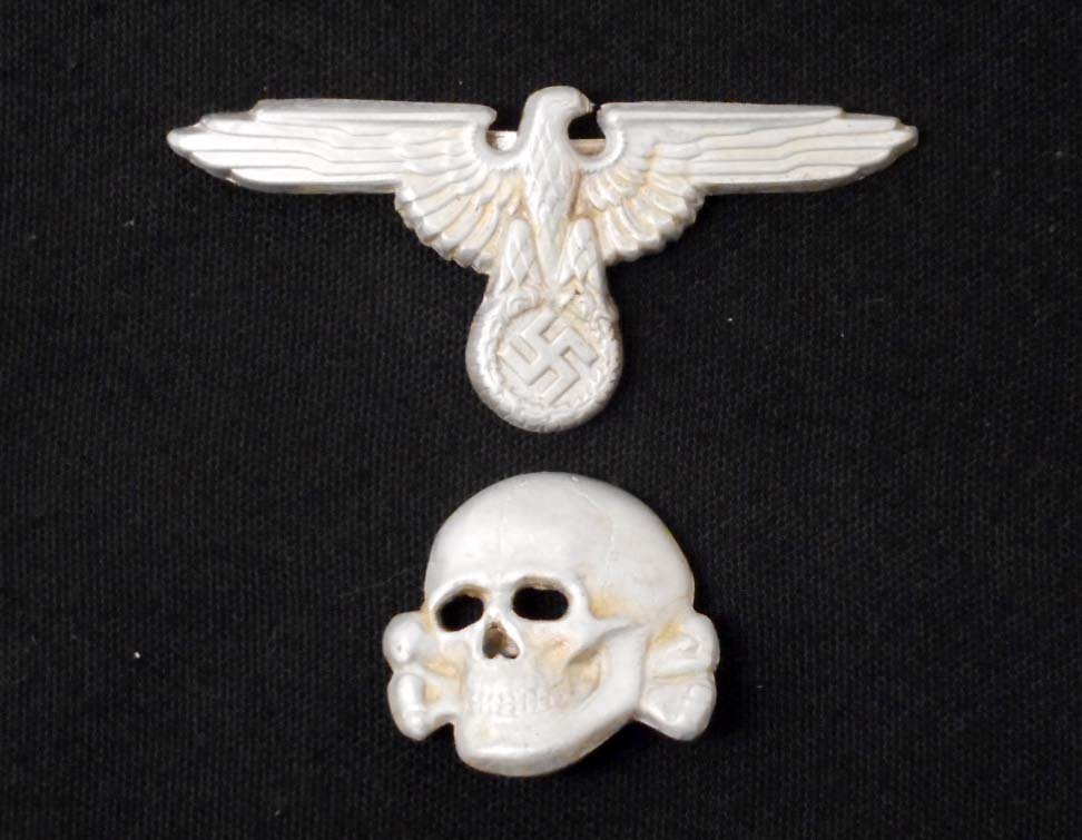 PAIR OF NAZI GERMAN SS HAT BADGES: Poss Post War