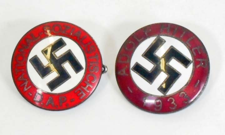 LOT OF 2 GERMAN NAZI POLITICAL ENAMELED PARTY BADGES: The first one reads 'National - Sozialistsche DAP'. The second one reads 'Adolf Hitler 1933'. Both are maker marked 'RZM M1/129'. They have a thin horizontal pin back. Nickel construction with enamel.
