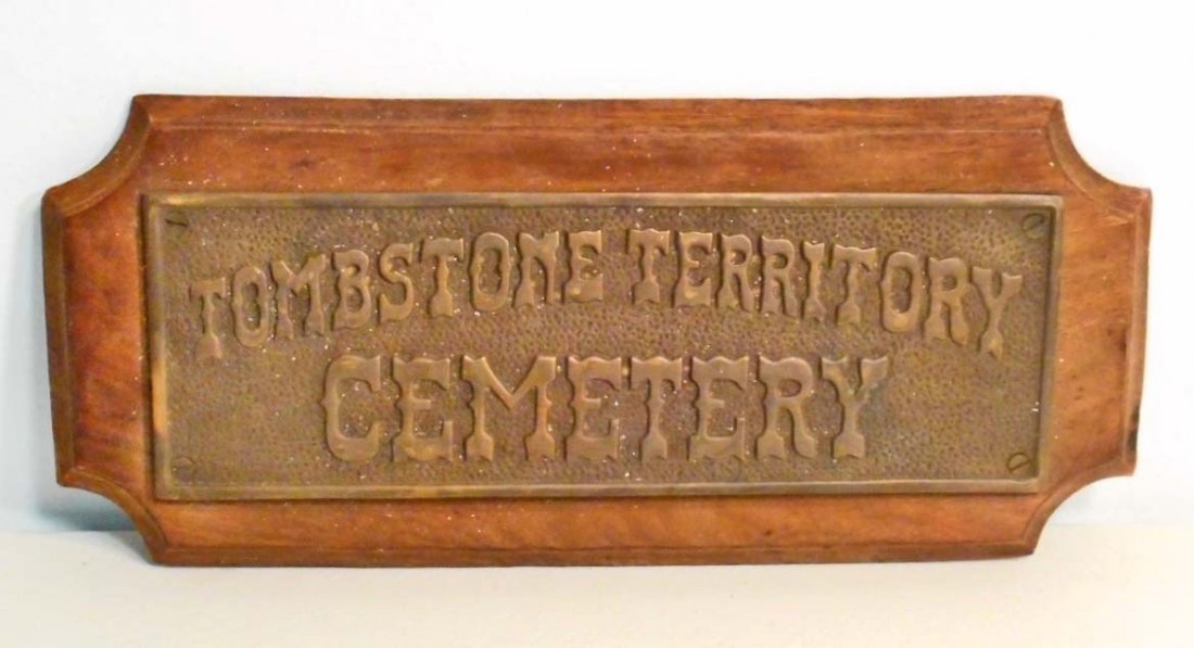 CAST IRON AND WOOD TOMBSTONE TERRITORY CEMETARY PLAQUE: Approx. 10.5" by 4.5"