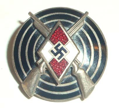 NAZI GERMAN HITLER YOUTH HJ MARKSMAN SHOOTING AWARD: . Measures 7/8" in diameter. Maker marked 'RZM M1/14'. Pin back. Two piece nickel construction with enamel.