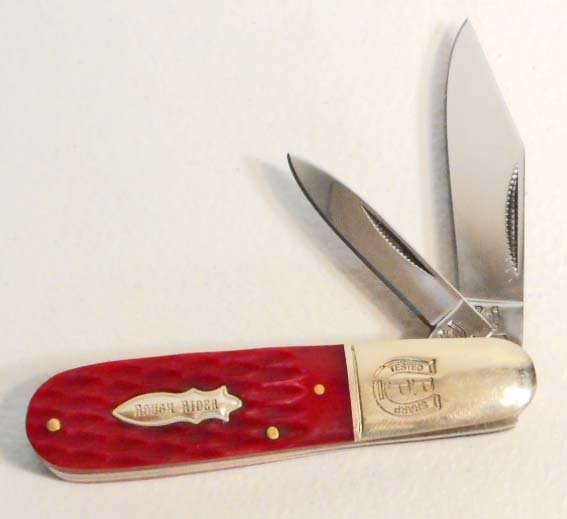 ROUGH RIDER POCKET KNIFE W/ RED JIGGED BONE HANDLE: Approx. 3.5" long closed