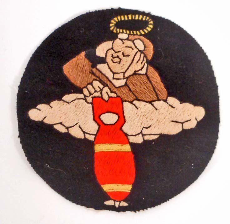 USAAF ARMY AIR FORCE 355TH BOMB SQUADRON FLIGHT JACKET: Measures 4 7/8" in diameter. Hand and machine embroidered on a black wool backing. Theater made