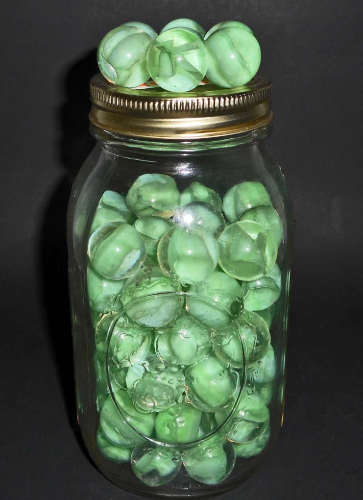 LARGE JAR OF VINTAGE GREEN RIBBON CORE SHOOTER MARBLES: N/A