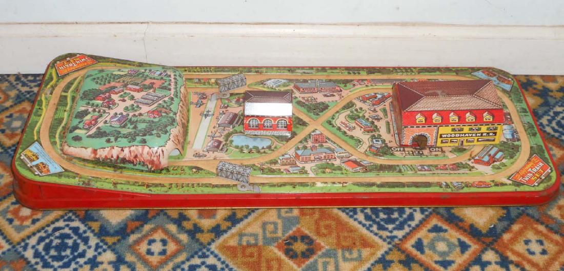 VINTAGE TIN LITHO TWIN TRAIN SET TOY: Woodhaven Metal Stamping Co. Approx. 27.5" by 11.5". Not complete, as pictured.