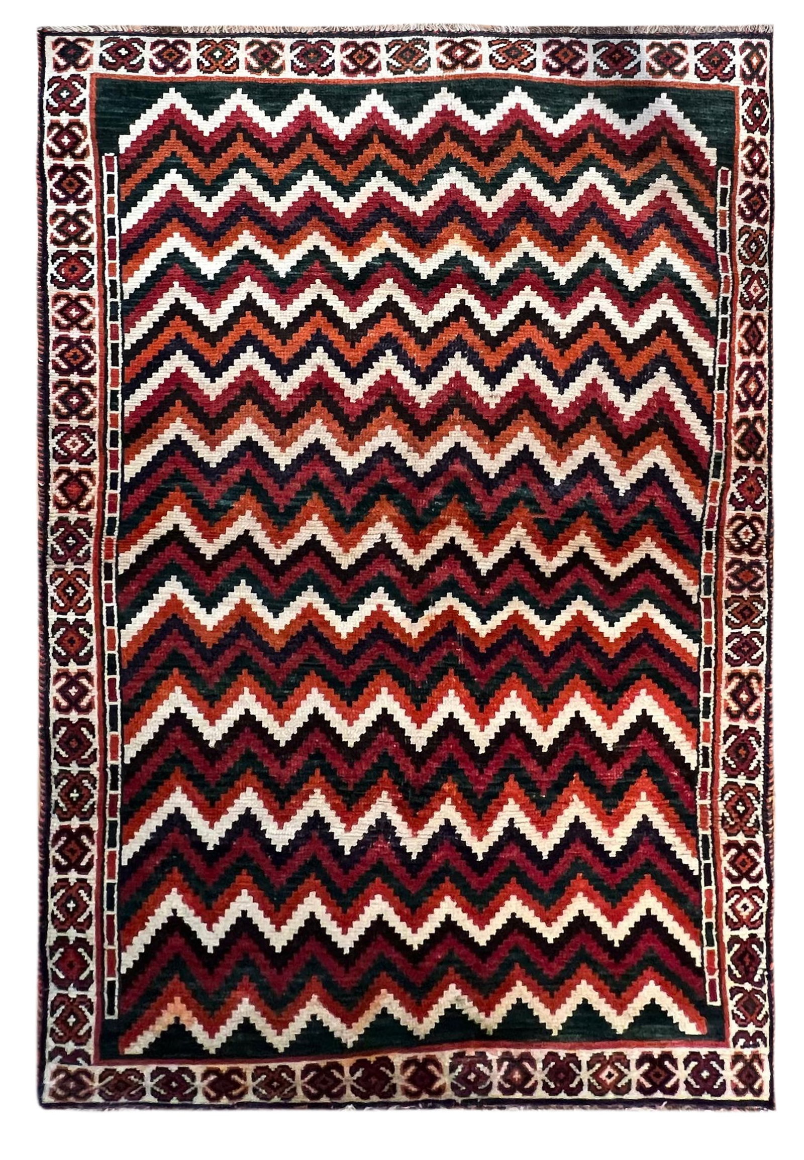 Vintage Persian Qashqai Chevron-Design Rug 3 ft 6 in x 6 ft 2 in (1.07 m x 1.88 m): Curated collection of antique, vintage and decorative rugs Size: 3 ft 6 in x 6 ft 2 in (1.07 m x 1.88 m) Provenance: Property from a New York rug collection