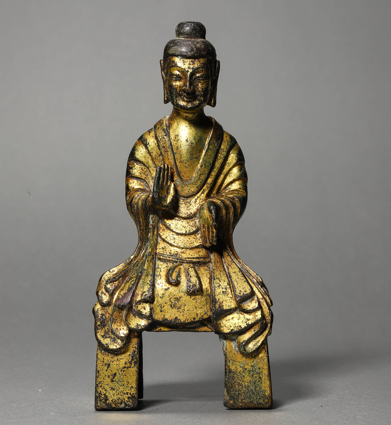 A TIBETAN GILT-BRONZE FIGURE: A TIBETAN GILT-BRONZE FIGURE Height: 5 3/4 in. (14.5 cm)