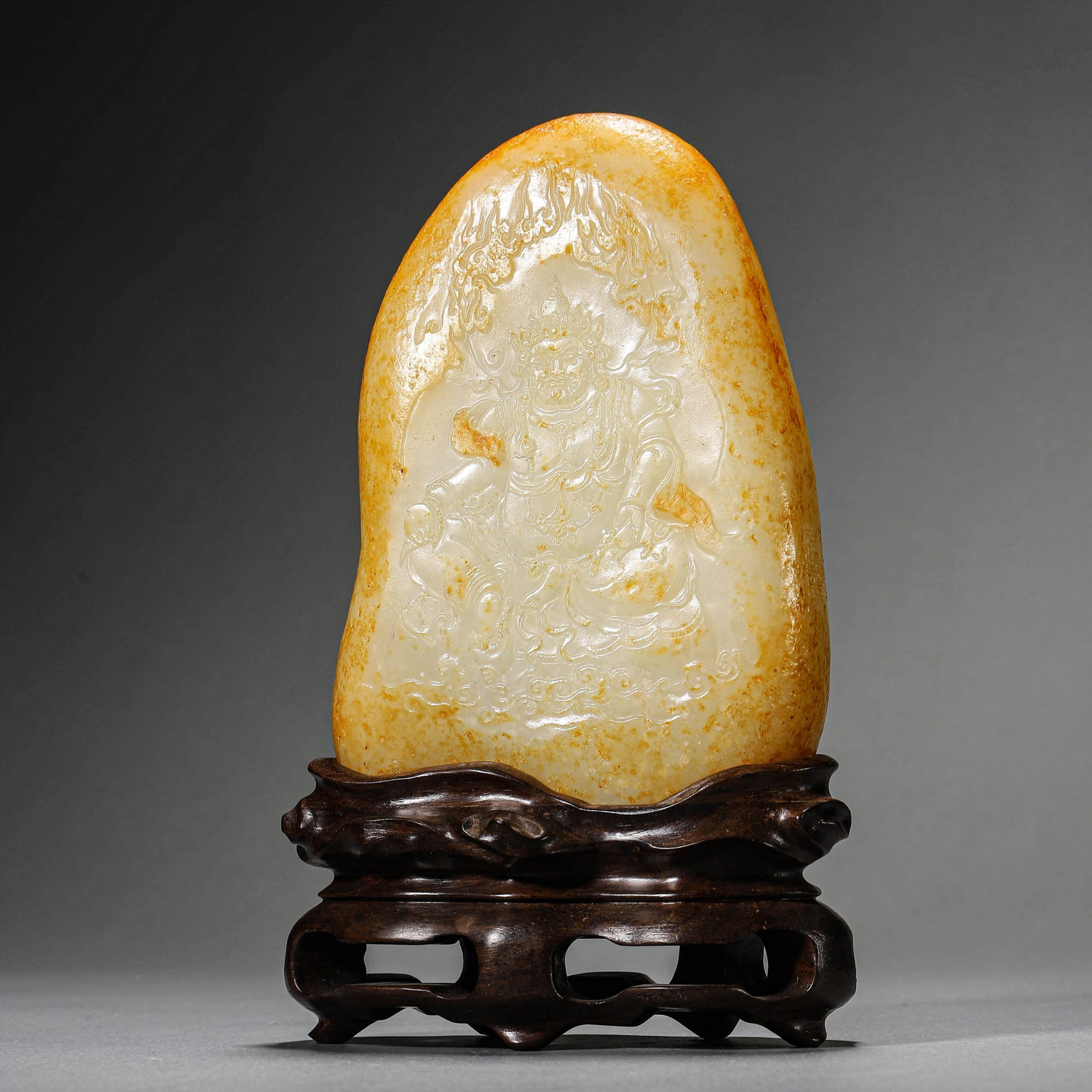 A HETIAN WHITE JADE BUDDHA FIGURE: A HETIAN WHITE JADE BUDDHA FIGURE Height: 8 1/8 in. (20.5 cm)