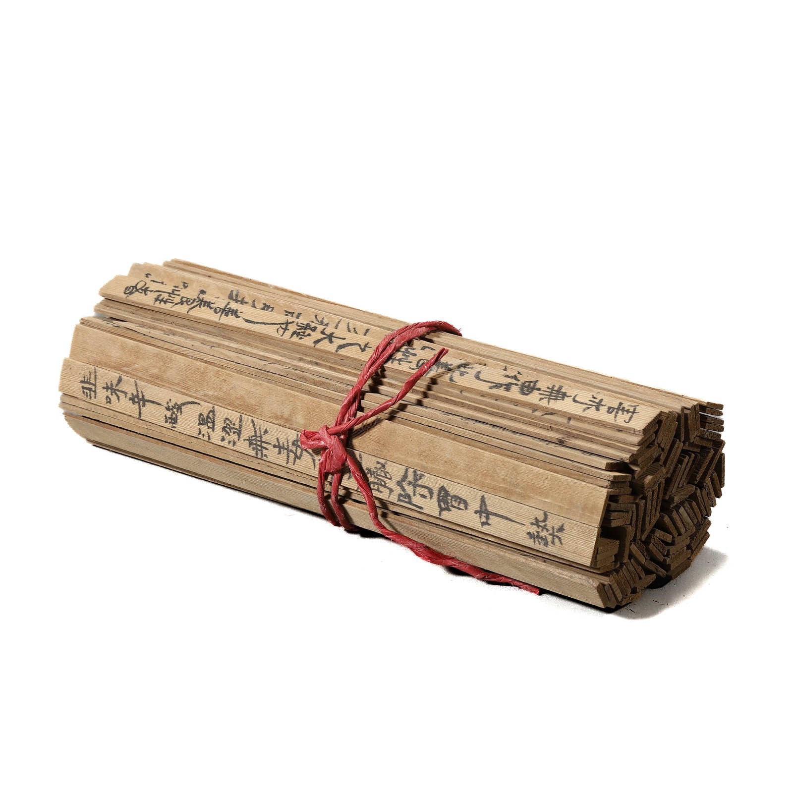 A WOODEN TABLET: A WOODEN TABLET Length: 11 1/4 in. (28.7 cm)