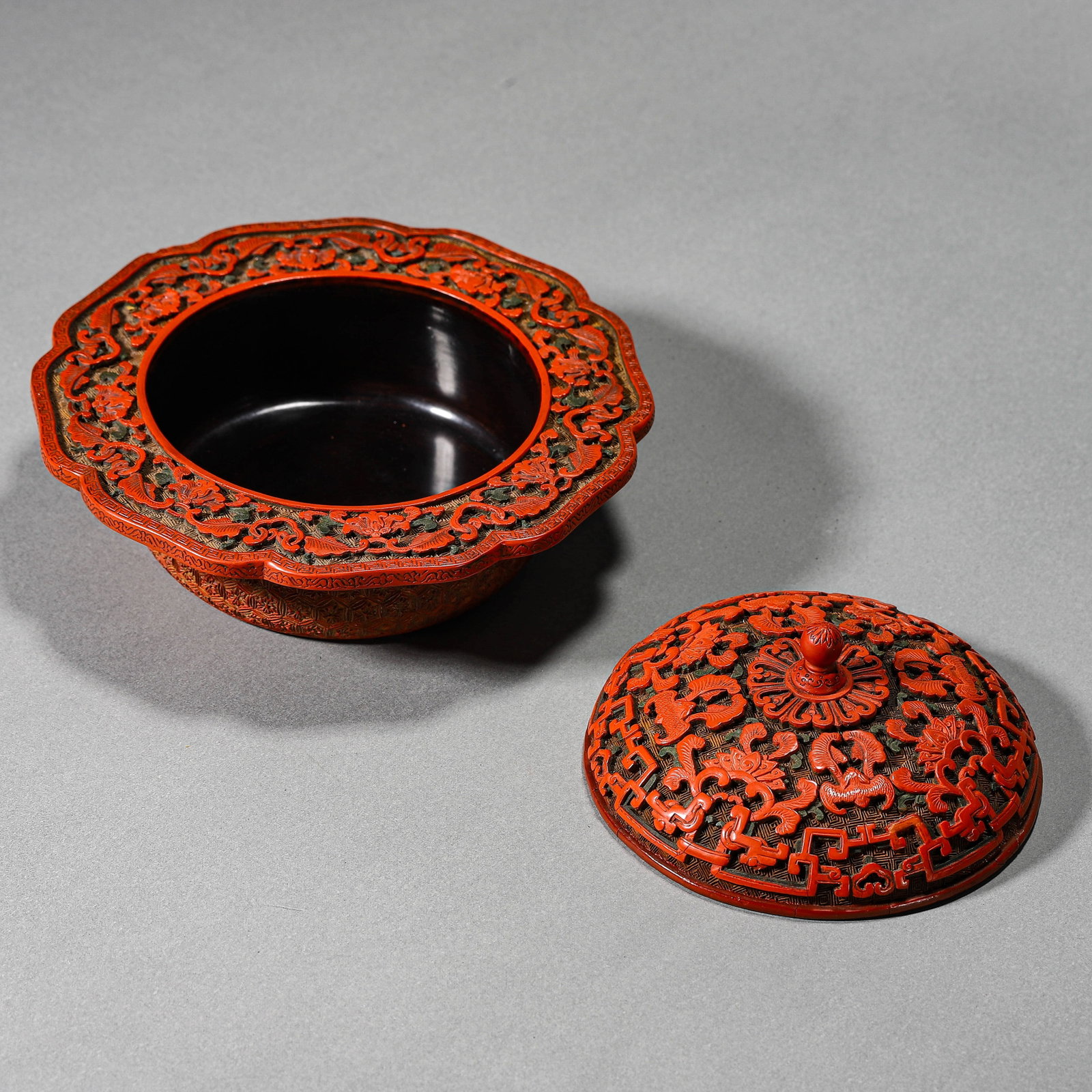 A CARVED CINNABAR LACQUER COVERED BOX - 6