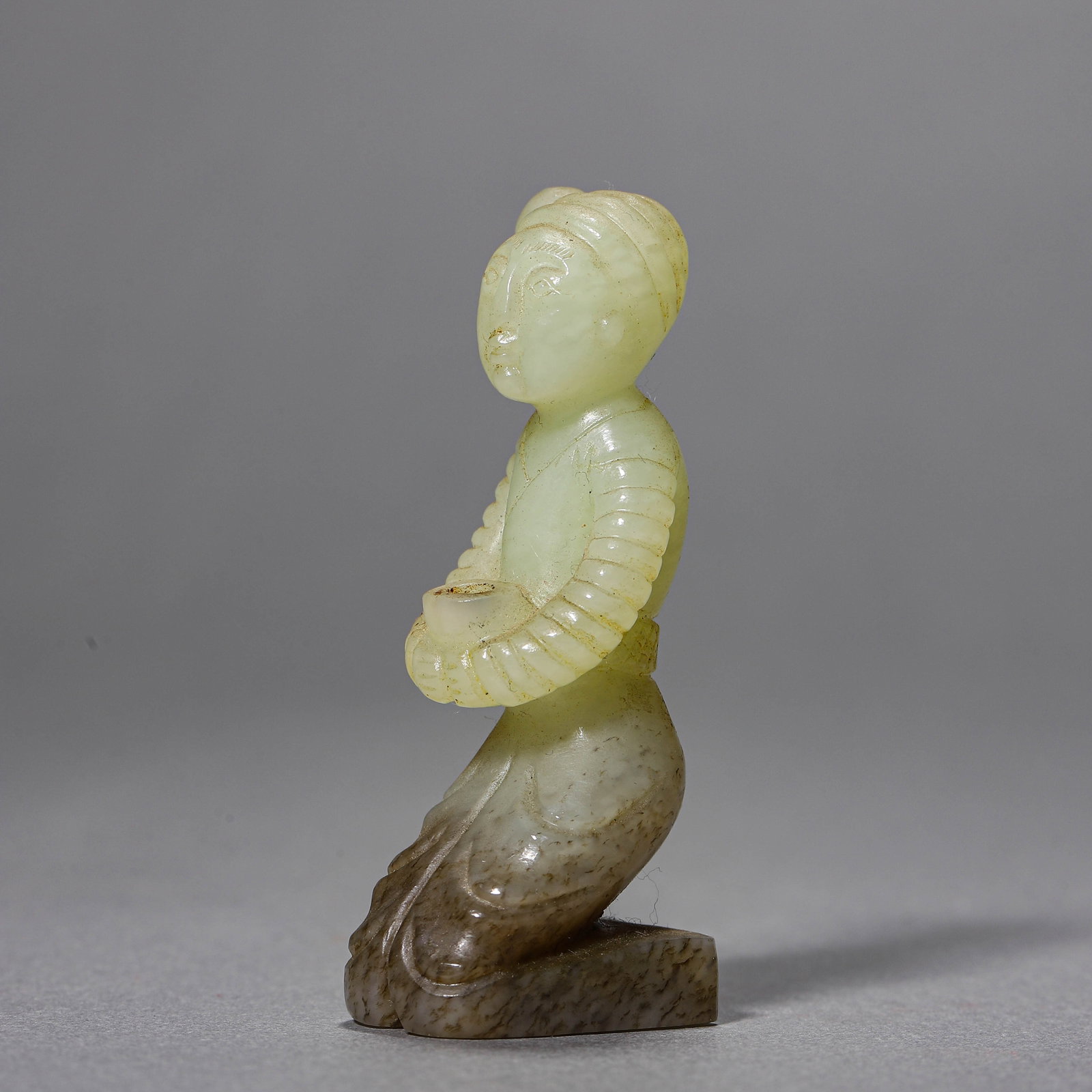 A JADE KNEELING FIGURE - 2