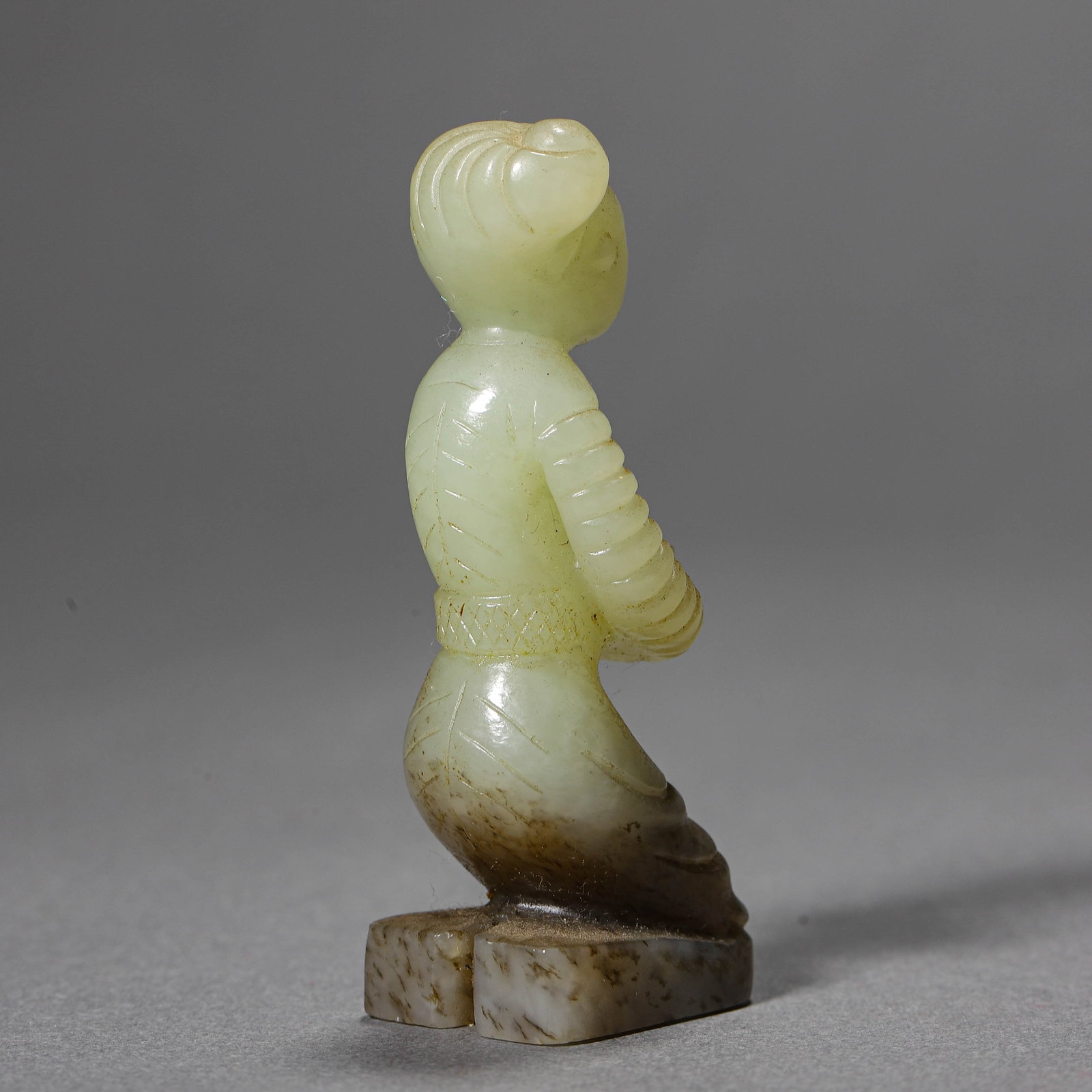 A JADE KNEELING FIGURE - 5