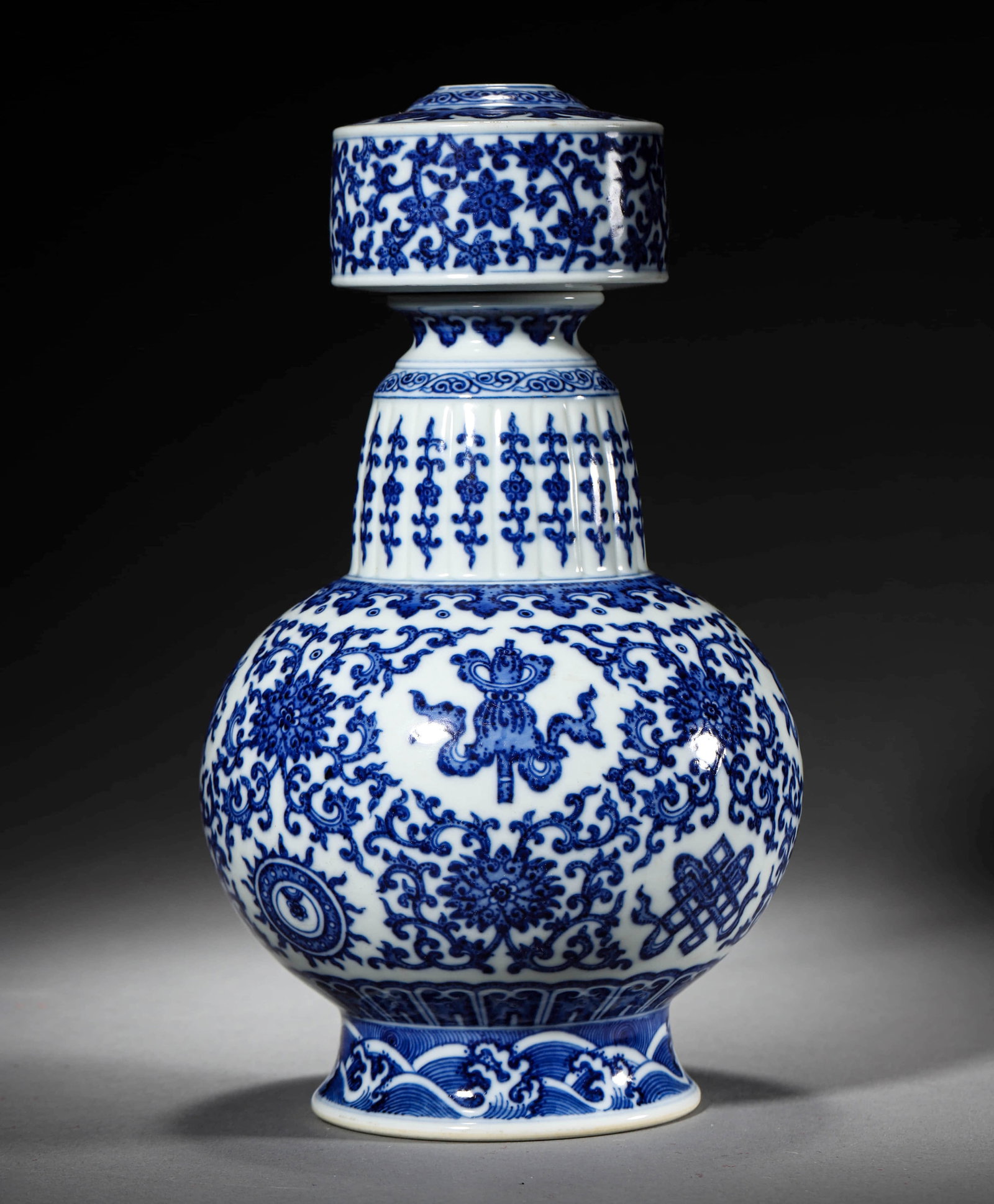 A BLUE AND WHITE 'EIGHT AUSPICIOUS SYMBOLS' BUMPA VASE (1 of 8)