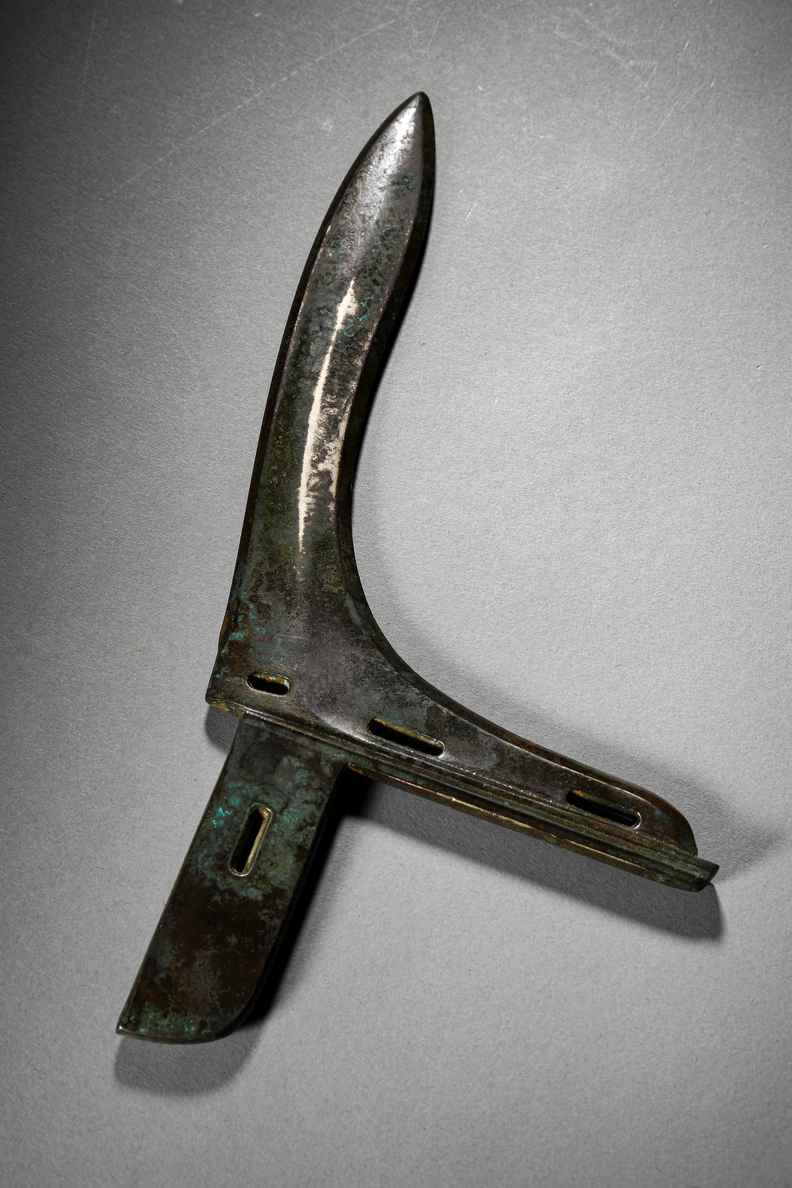 A BRONZE GE: A BRONZE GE Length: 11 in. (28 cm), Width: 5 5/16 in. (13.5 cm)