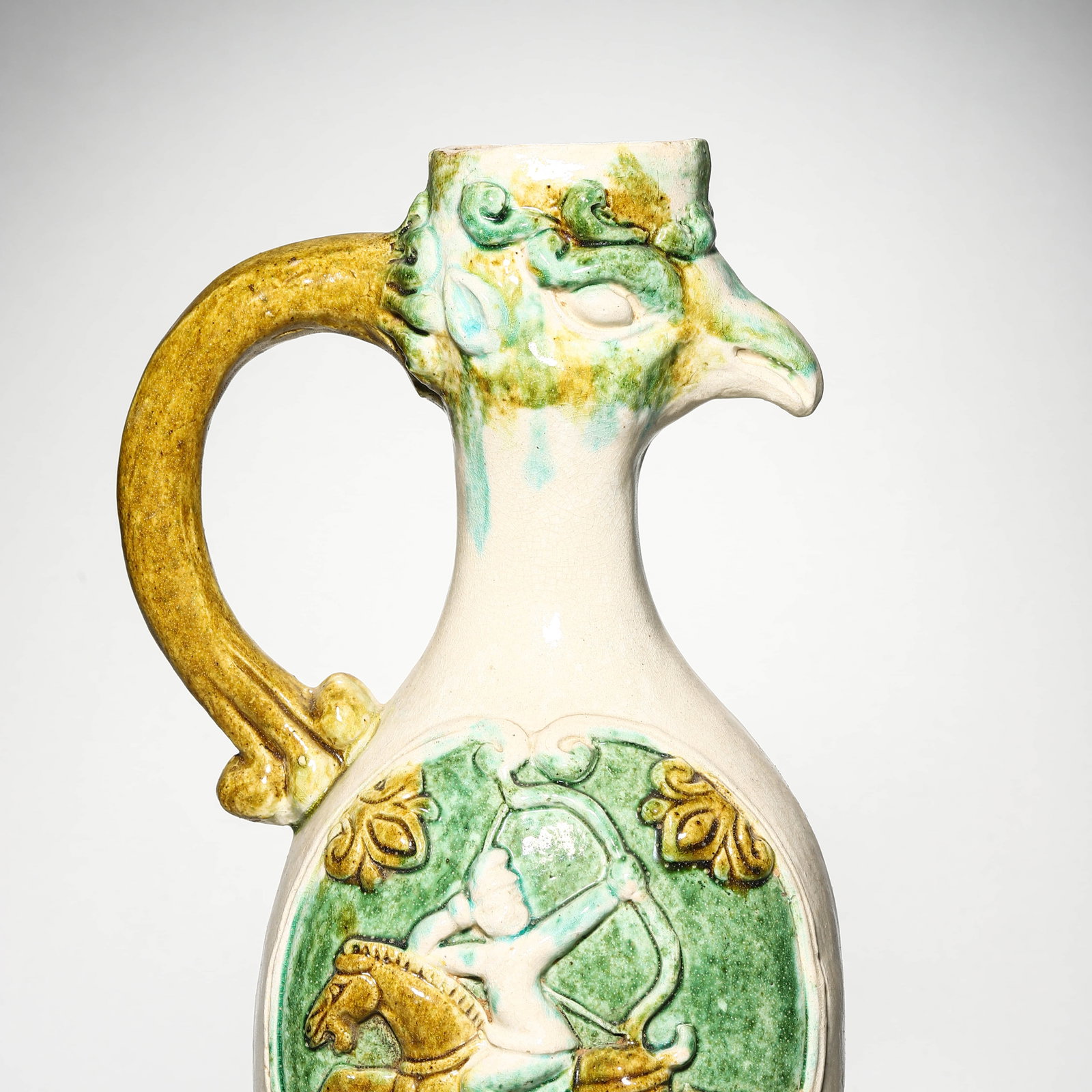 A SANCAI-GLAZED PHOENIX-HEAD EWER - 2