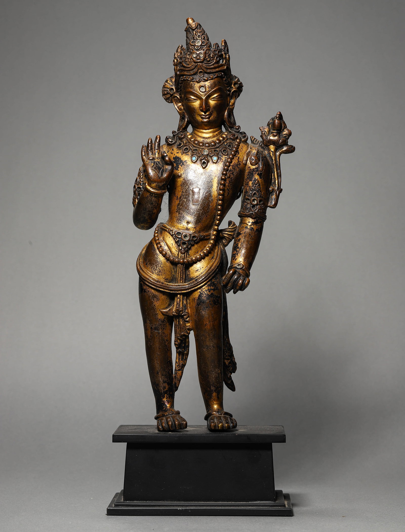 A GILT-BRONZE BUDDHA FIGURE: A GILT-BRONZE BUDDHA FIGURE Height: 6 7/8 in. (17.5 cm)