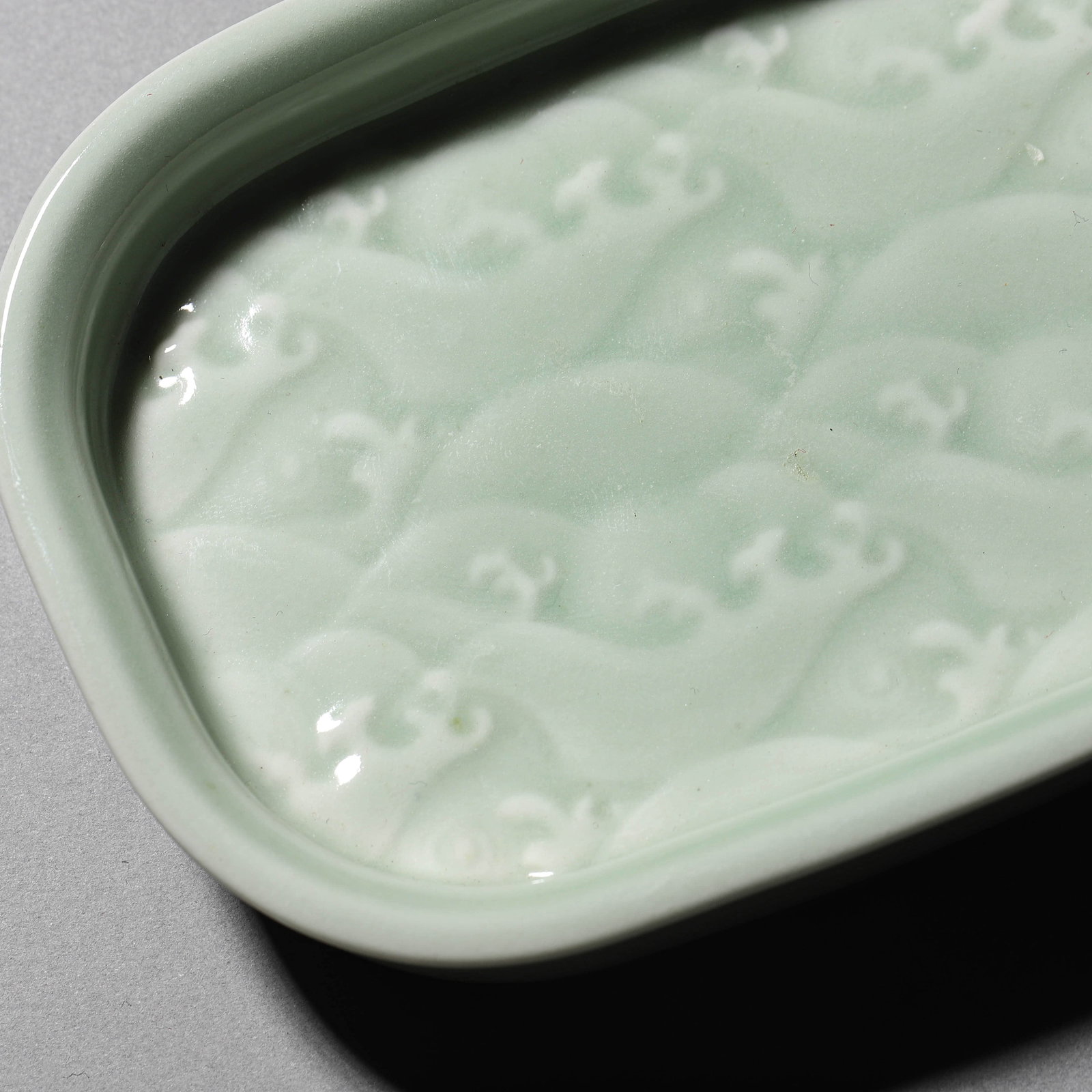 A CELADON GLAZED BRUSH REST - 2