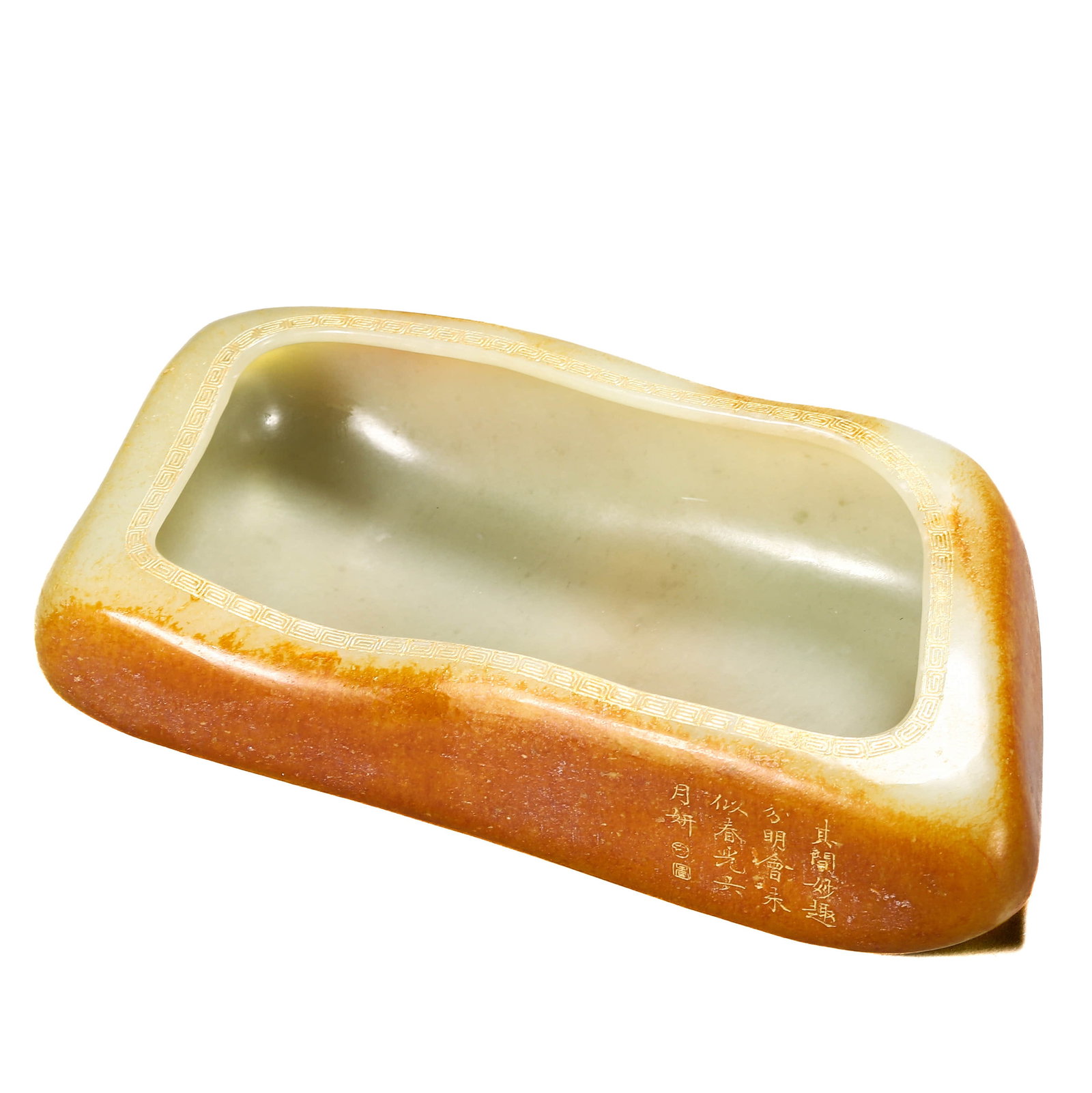 A JADE BRUSH WASHER: A JADE BRUSH WASHER Length: 8 1/4 in. (21 cm), Width: 4 1/8 in. (10.5 cm), Height: 2 in. (5 cm)